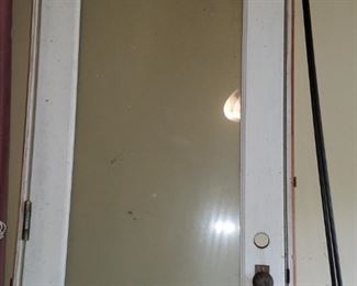Door with vintage hardware