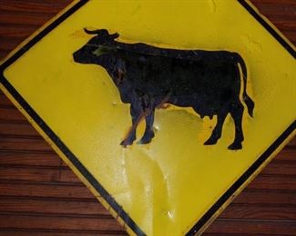 Cow crossing sign
