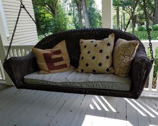 Vintage wicker porch swing