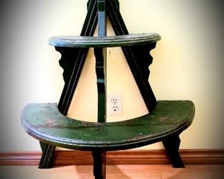 green wooden plant stand