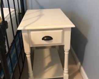 End table or nightstand with storage.