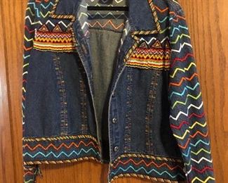 Jean jacket by famous designer with a lot of beadwork