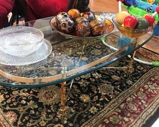 glass coffee table and rug