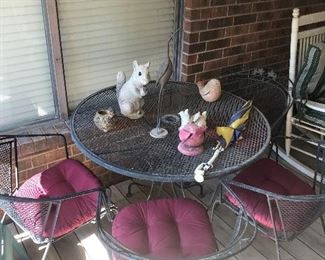 round metal lawn furniture and table