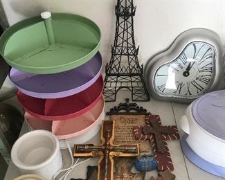 crosses and Tupperware and Salvatore Dali clock