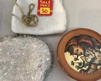 Vintage clutch bags and swiss musical instrument