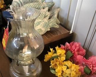 Hurricane lamp fish sculptures