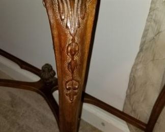 Carving on demilune table