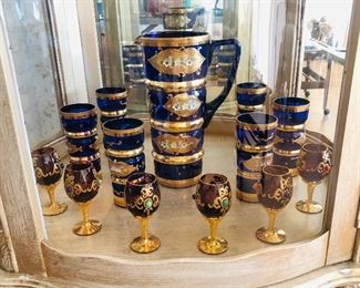 Murano Blue and 24kt Pitcher and glass set, also a purple cordial glass set.