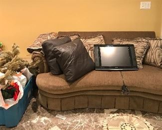 comfy sofa, leather pillows, and Christmas