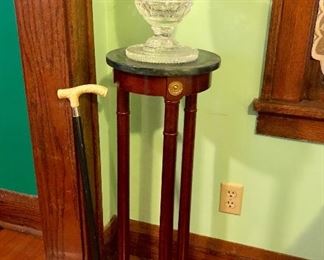 Plant stand with marble top, ivory topped cane, Waterford bowl