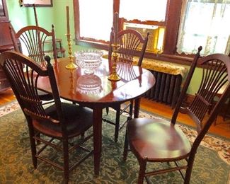 Dining table and set of 4 chairs (with 3 extra leaves)
