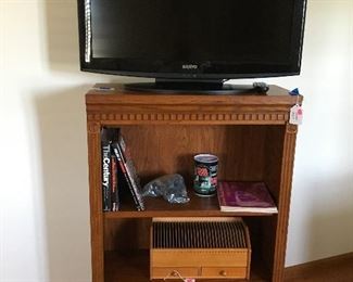 Visio television and bookcase