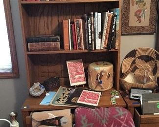 Bookcase with Native American weaving and patterned blanket
