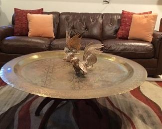 Large brass coffee table with brass fighting cocks