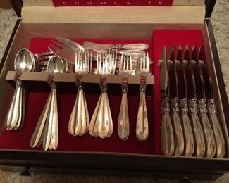 A sample of the 108 piece set of Danish sterling flatware