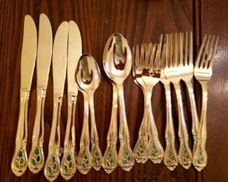 Christmas gold tone flatware, service for four.