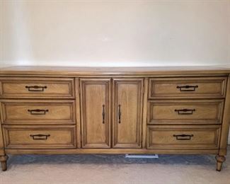 Solid wood triple dresser by White Fine Furniture.  Total of nine drawers (3 behind center double doors).  