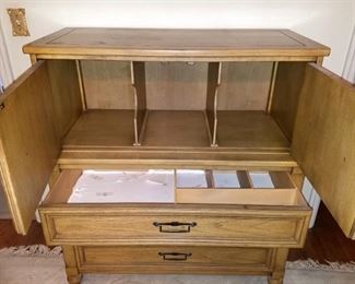Large solid wood chest by White Fine Furniture.  Three large drawers and sectioned storage area behind doors.  41" wide, 19" deep, 46.5" tall.