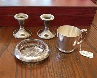 Silver plated short candle holders, small cup and sterling silver rimmed crystal coaster.