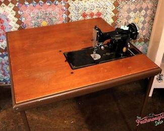 Please note we do not have the featherweight. This is was taken to show how the table is used with machine.