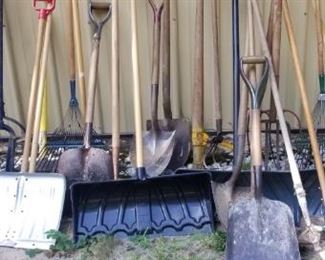 LOTS OF SHOVELS, RAKES, ETC...