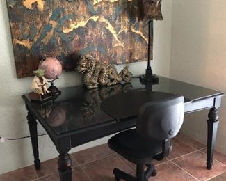 This desk is actually a table that has matching bench and chairs..sold separate