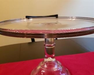 Clear glass cake plate. 10" tall 14" diameter.