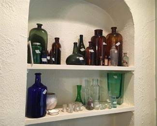 Collection of antique pharmacy bottles