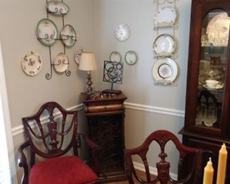 Lots of plates and plate hangers
Beautiful dining table, chairs and China cabinet