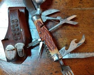 Rare.. camping knife with 10 different items on it and horn handle