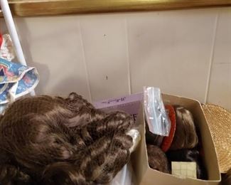 Lots of doll wigs, some human hair