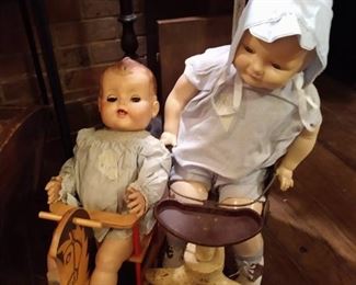Dolls checking out their friend on the rocking horse