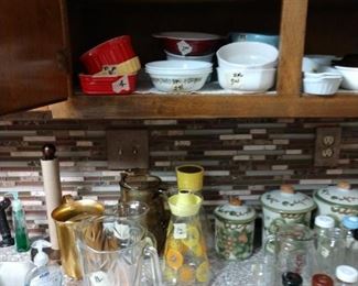 Vintage baby bottles and vintage water pitchers