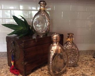 One of several boxes with Sterling covered pinch bottles. They look great on a bar.  Ideal man’s gift.