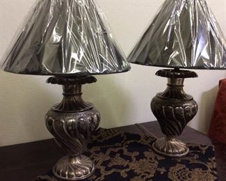 Unusual and very smart silver lamps with black shades. 29 x 19
