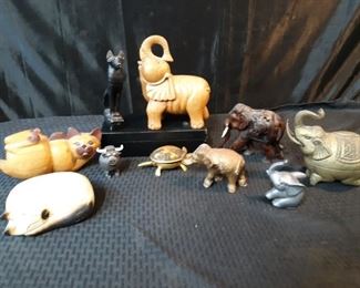 Elephants, cats, turtle and a bull figurines