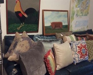 Custom pillows, folk art. Leather sofa is not for sale.