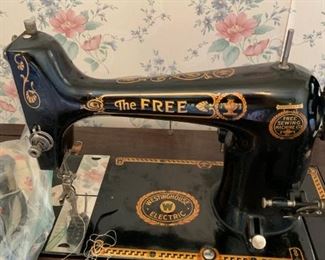 #8		The Free (Westinghouse) Black Vintage Sewing Machine in cabinet	 $75.00 
