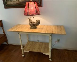 #16		Laminate Drop-side Table w/casters  30-49x17.5x29	 $40.00 

