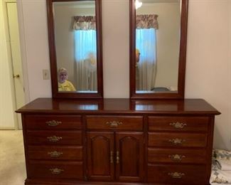 #50		Wood Dresser w/9 drawers & 2 doors (3 drawers inside) 42x19.5x33   Mirror 22.5x50 Each Panel	 $175.00 
