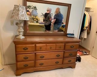#52		Wood Dresser w/9 drawers Maple w/laminate top  60x17x32  Mirror  44x32.5	 $150.00 

