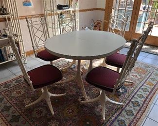 White table; 6 chairs, 1 leaf