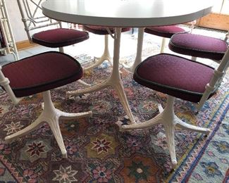 Wrought iron bottom chairs and table
