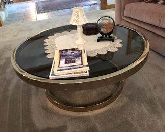 Round brass with smoked glass coffee table