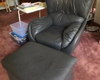 Grey leather chair with ottoman