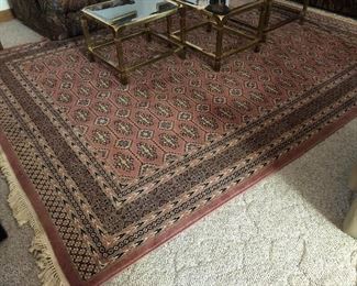 Area rug; brass nesting tables