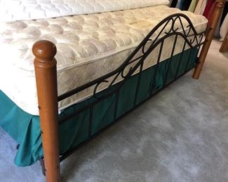 Wrought iron and wood king size bed