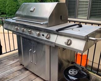 Jenn-Air 4 burner gas grill with side burner in stainless steel Jenn-Aire stainless steel rotisserie kit Travel grill