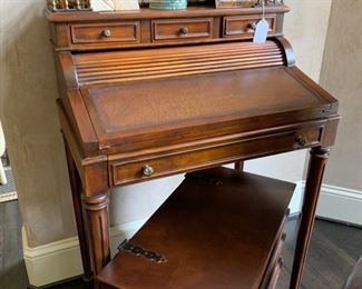 Secretary desk by Theodore Alexander (antique reproduction)                                                                                              Bookend end table that opens